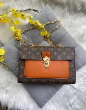 Vuitton Victorie Tan Shoulder Bag